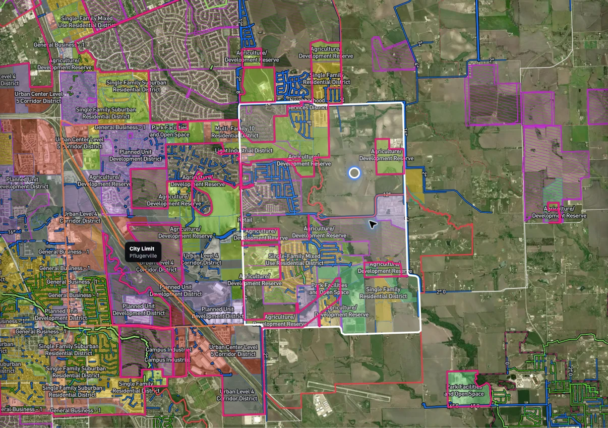 Parcyl map near Pflugerville showing zoning districts, the Pflugerville city limit, water lines with pipe sizes and an outlined study site